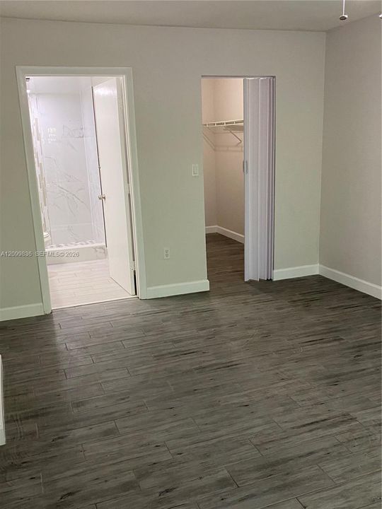 Primary bedroom and closet
