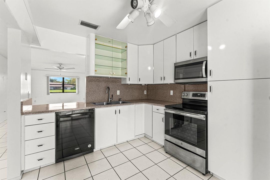 013-83WoodRoseCourt-RoyalPalmBeach-FL-33