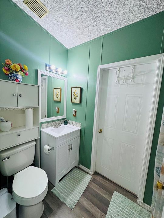 2nd bathroom - LT side of house is accessed by bedroom hallway or laundry room. Bathroom has 2 doors.