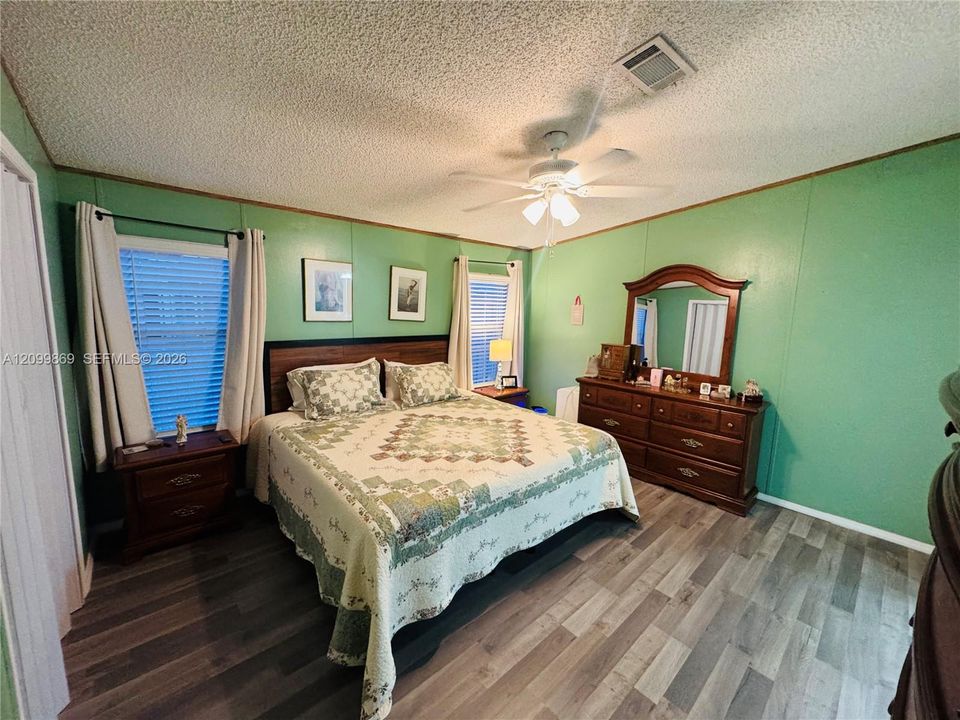 Master Bedroom easily fits KING size bed, dual nightstands, dresser and wardrobe and/or armoire