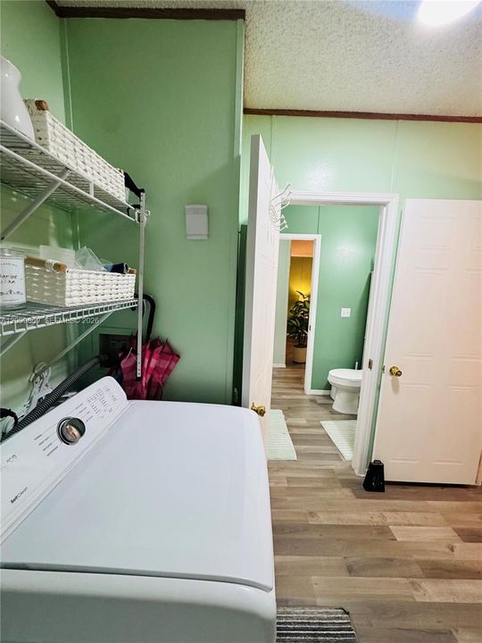 Laundry leads to backdoor and to 2nd bathroom