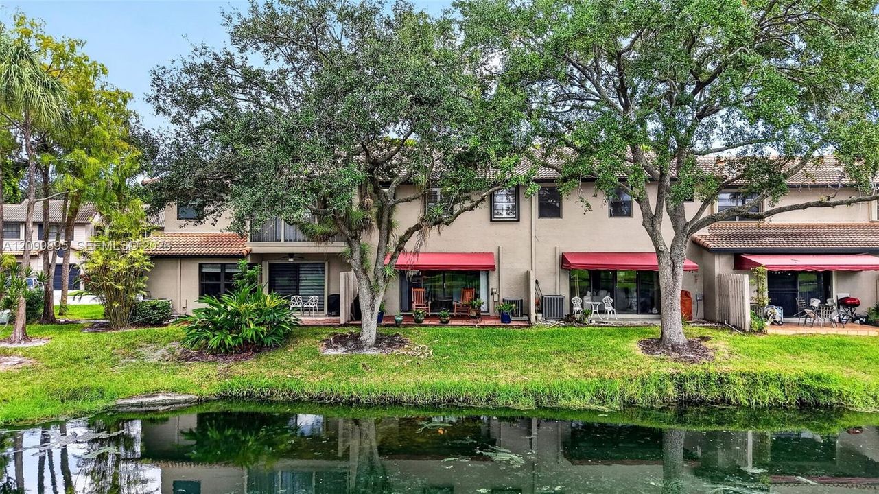 Private patio overlooking peaceful lake views and providing an inviting outdoor retreat.