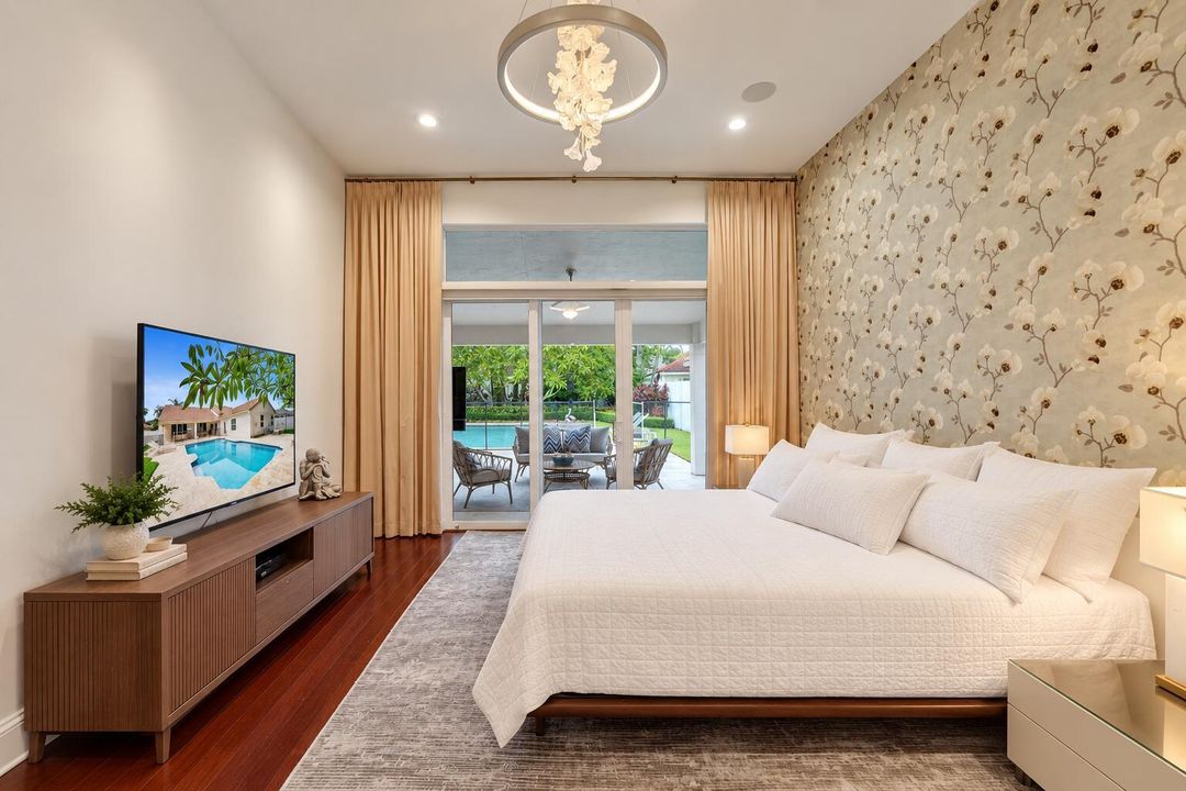 Serene Bedroom with Poolside Views