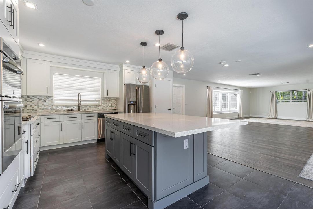 Kitchen open to living and dining