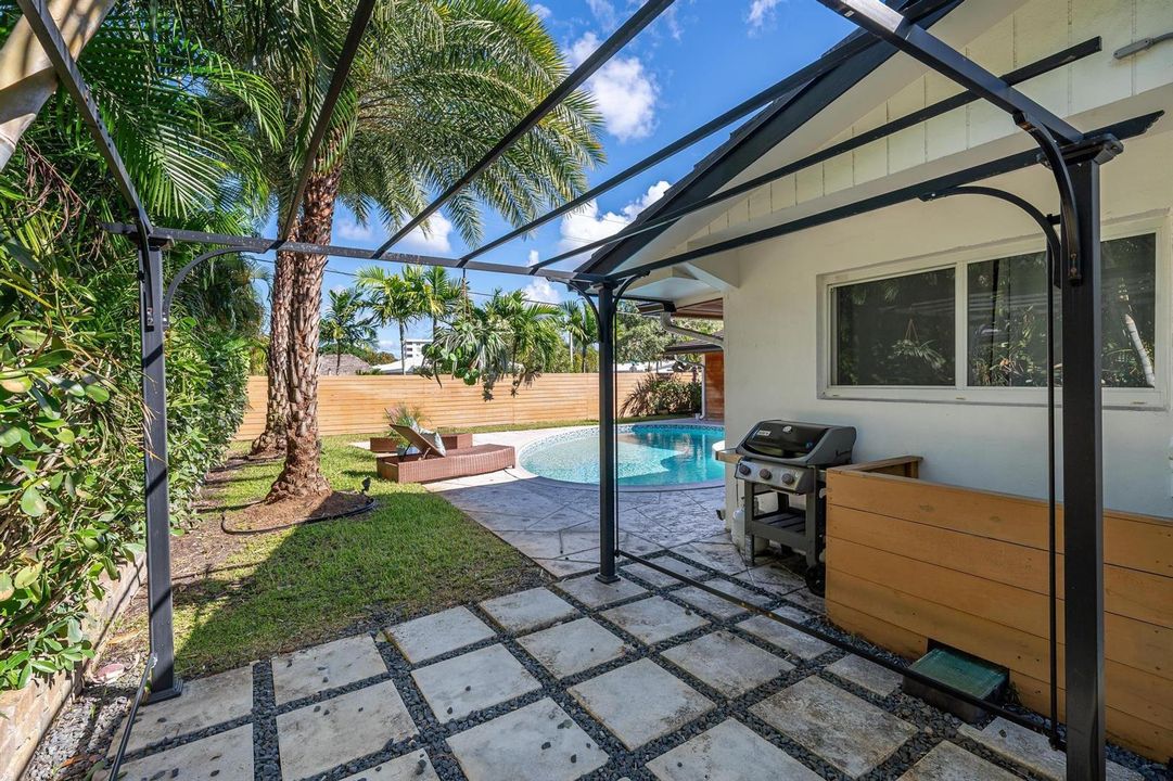 Side patio leading to the pool