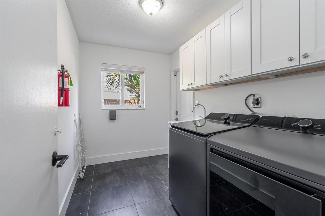 Laundry room with sink