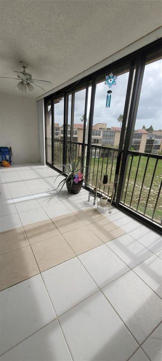 Spacious Balcony-Glass windows.