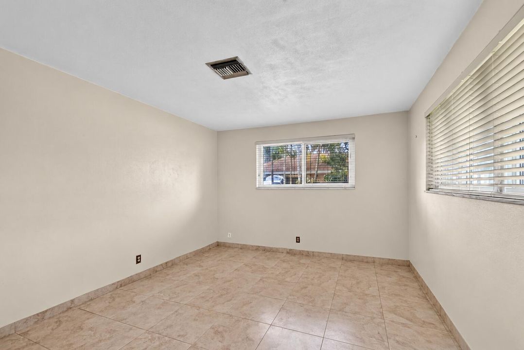 Bright Empty Beige-Tiled Room