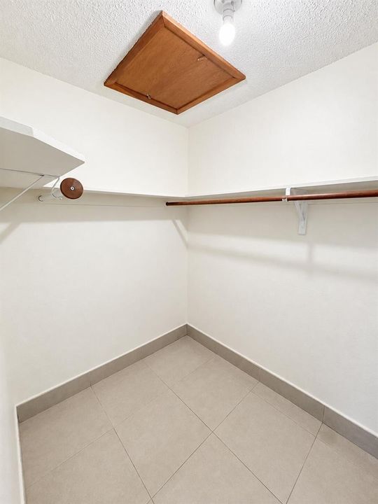 Bright Empty Walk-In Closet