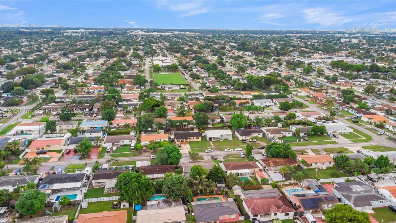 Aerial view of the residential landscape featuring established tree canopy, gridded street infrastructure, and proximity to regional urban centers