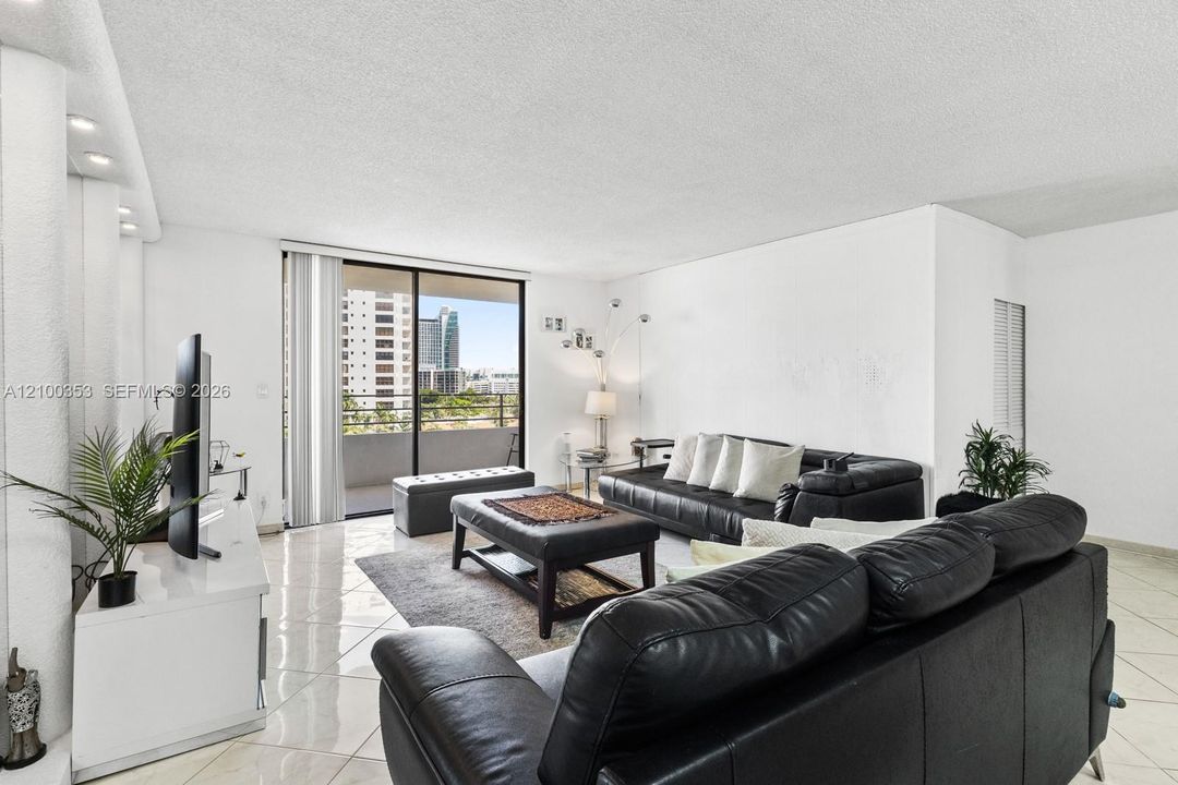 Living room opening to the balcony