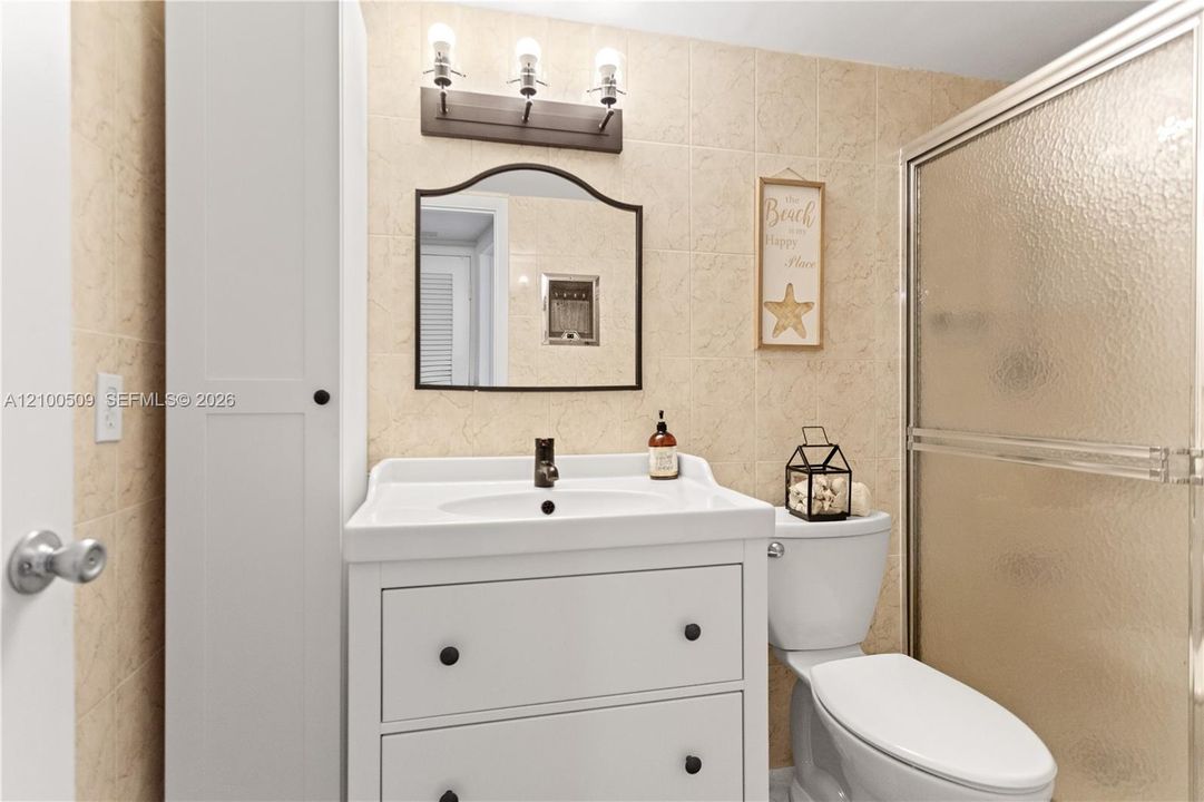 white vanity with integrated sink