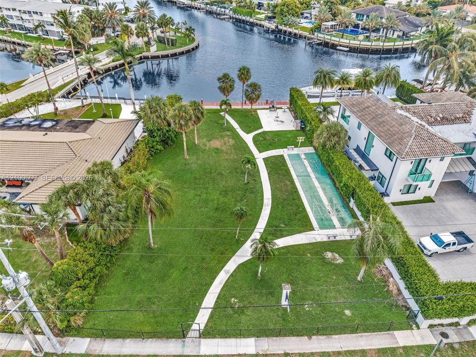 Enjoy condo-owned private park across the street with dock