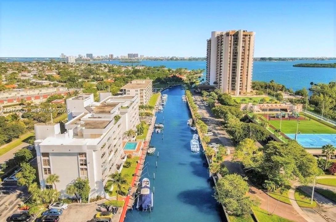 Waterfront property featuring a private boat dock with direct bay and ocean access
