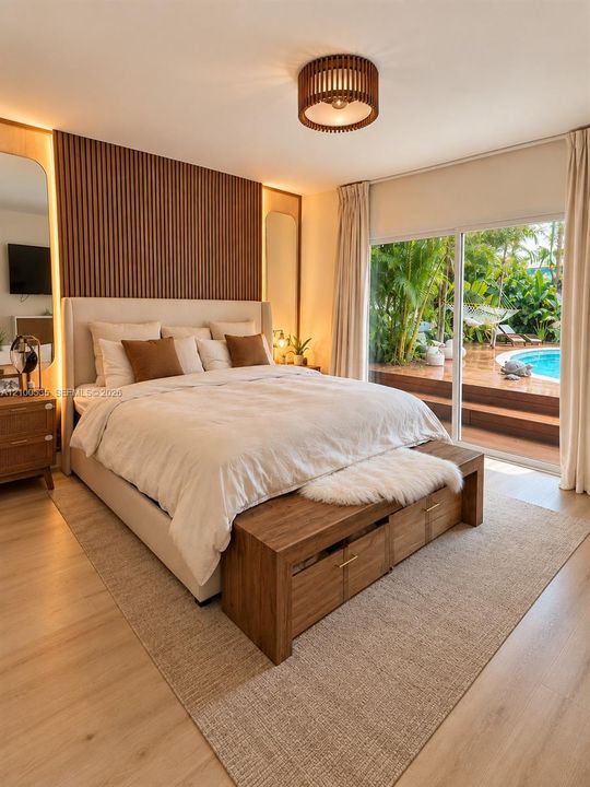 Master Bedroom with view to the tropical garden and Pool
