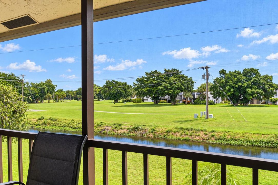 22-web-or-mls-Sunlit canal-side home wit