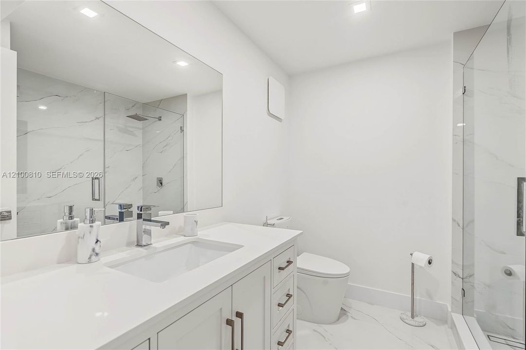 2nd Bathroom with access to 3rd bedroom upstairs