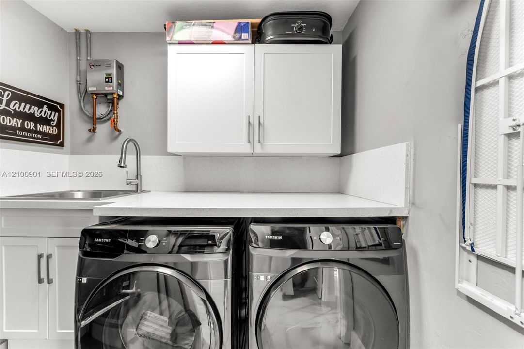 INSTA HOT, BUILT IN IRONING BOARD AND SINK...