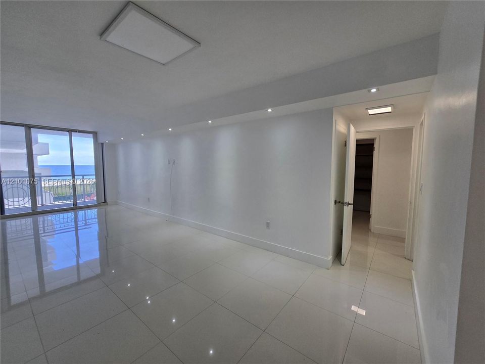 Living and entrance to primary bedroom