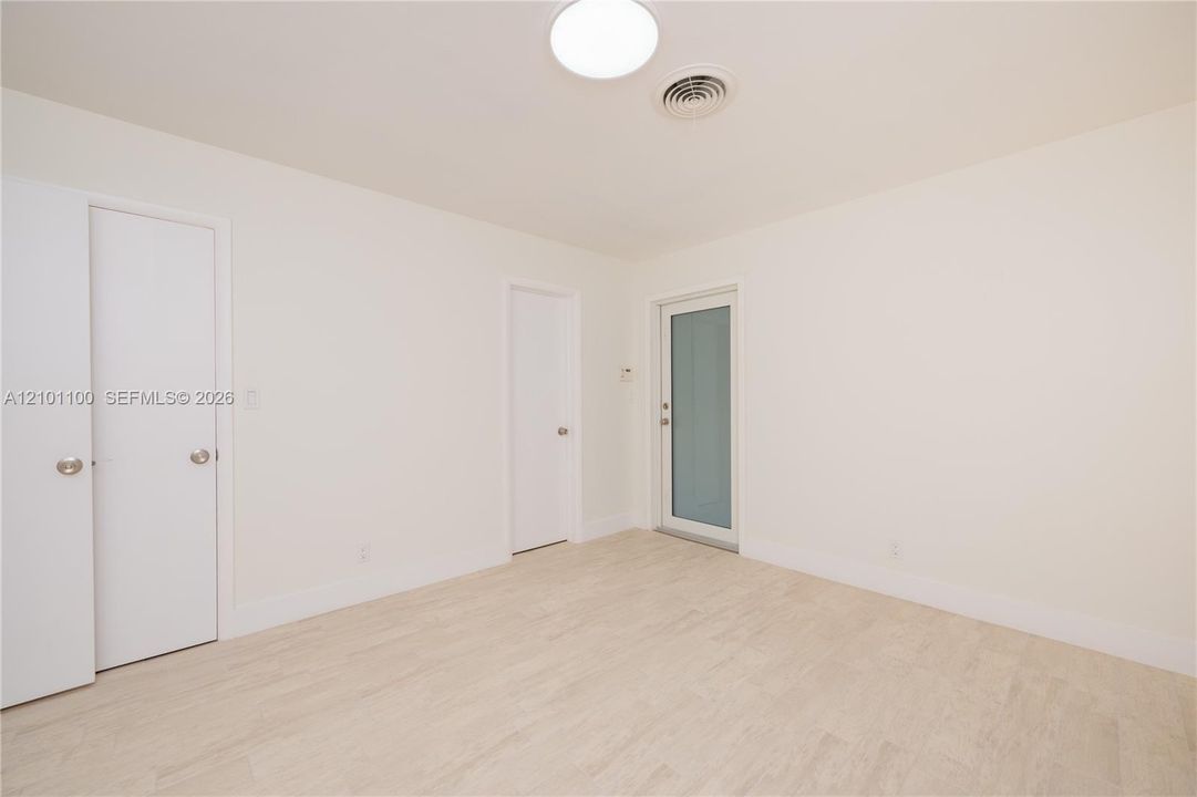 Large Master Bedroom/w a door to the Back Yard