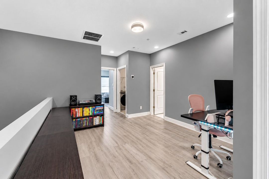Modern Gray Loft Workspace with Colorful