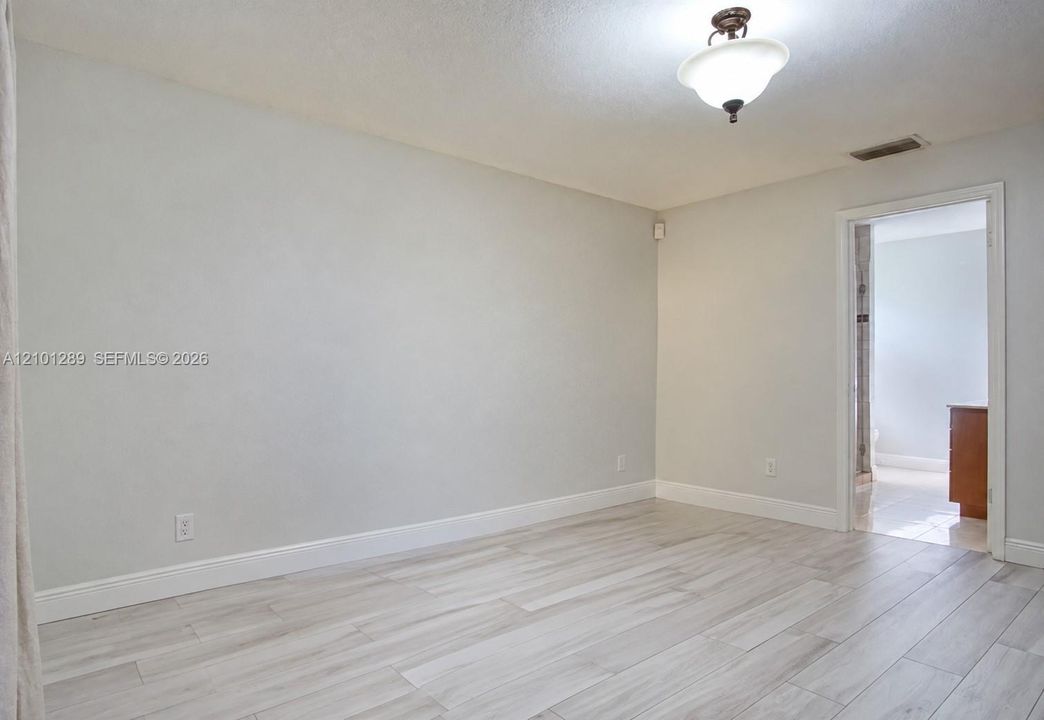 Master suite “Virtually edited – furniture and personal belongings removed.”