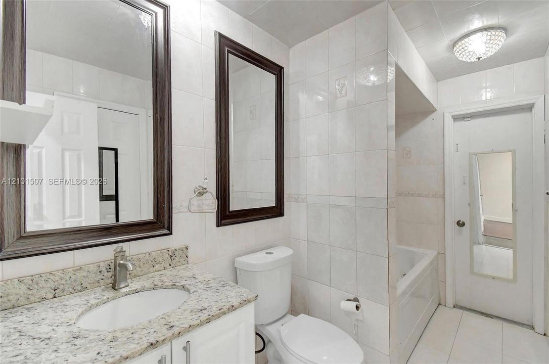 Bathroom 2 - dark framed mirrors