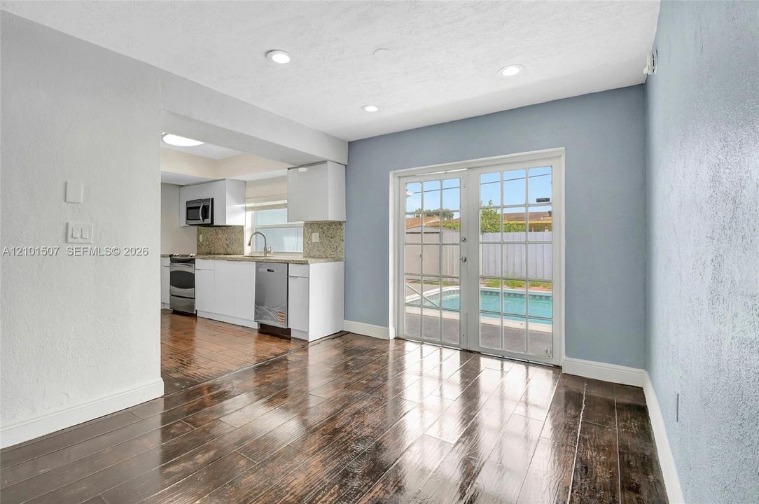 Area beside kitchen with patio access