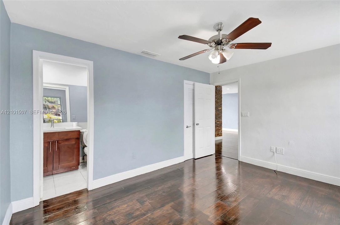Same blue-wall bedroom - bathroom access