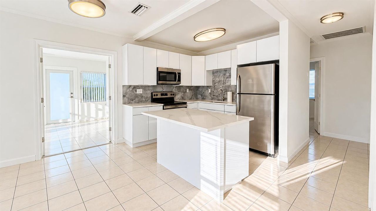 Bright Modern Kitchen with Sunlit Island