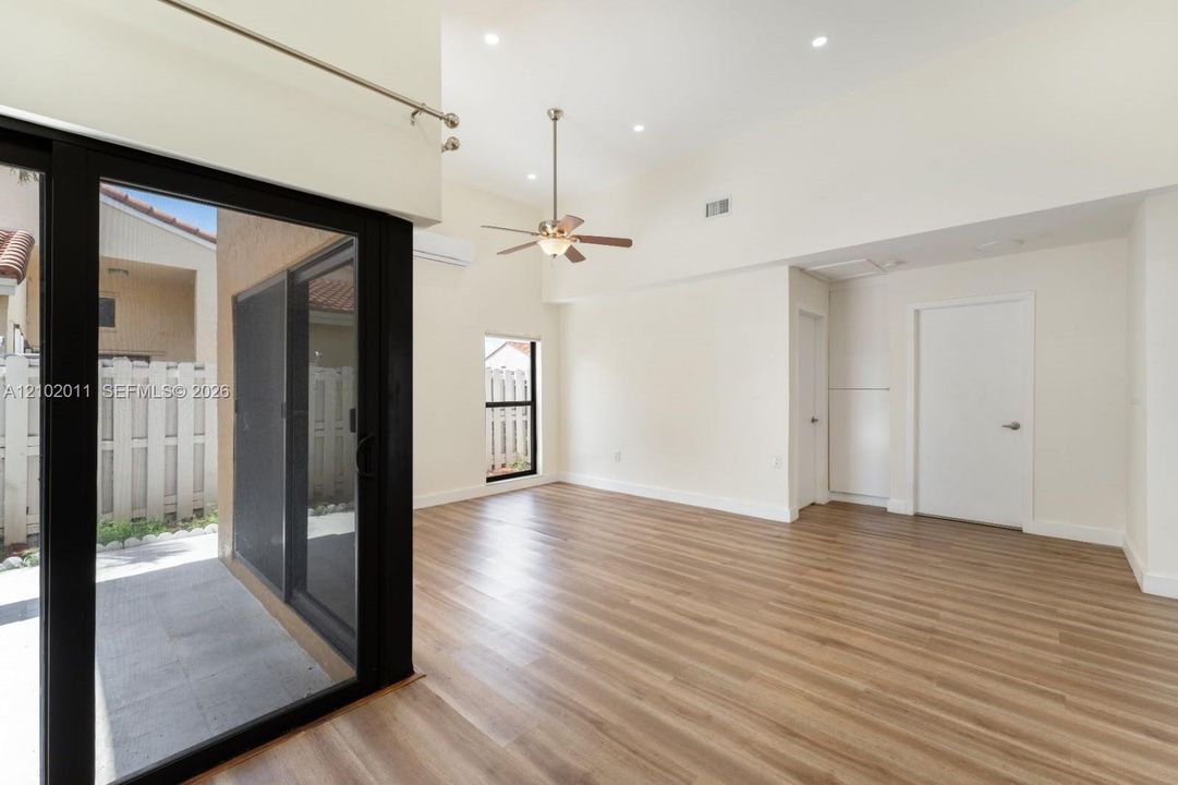 Vaulted ceilings and wood-finish flooring