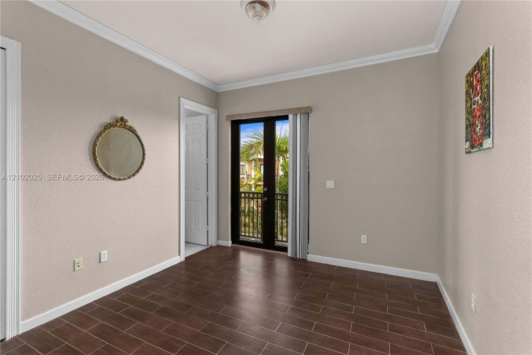 Front bedroom with balcony