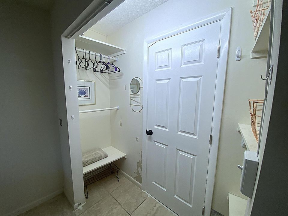 Master BR Closet + Door to Main Bath