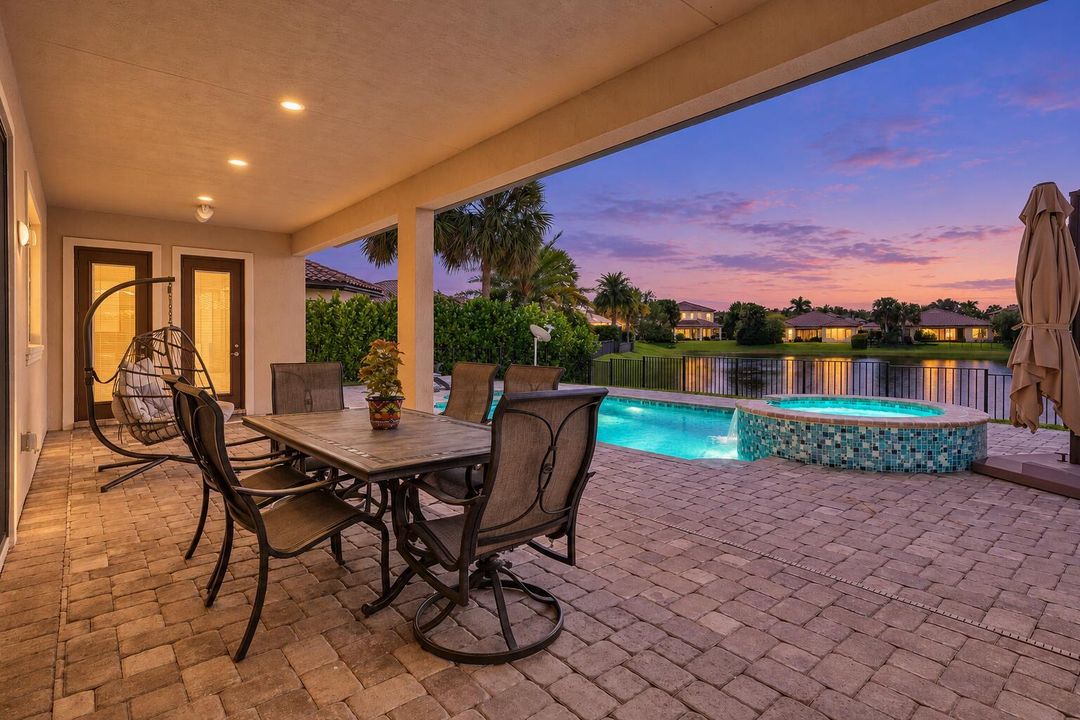 Twilight home with glowing pool-2