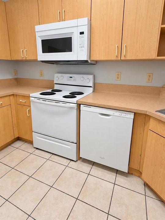 Bright natural kitchen with white applia