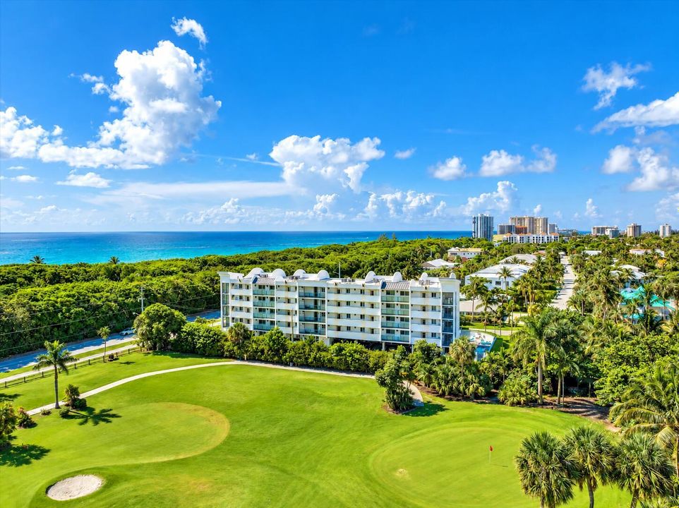 Sunlit Coastal Condo Golf Panorama
