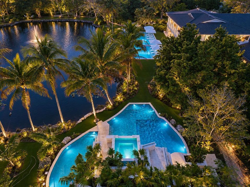 Twilight Estate with Glowing Pools