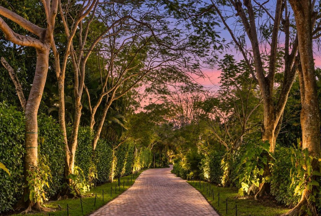 Soft twilight estate with glowing landsc