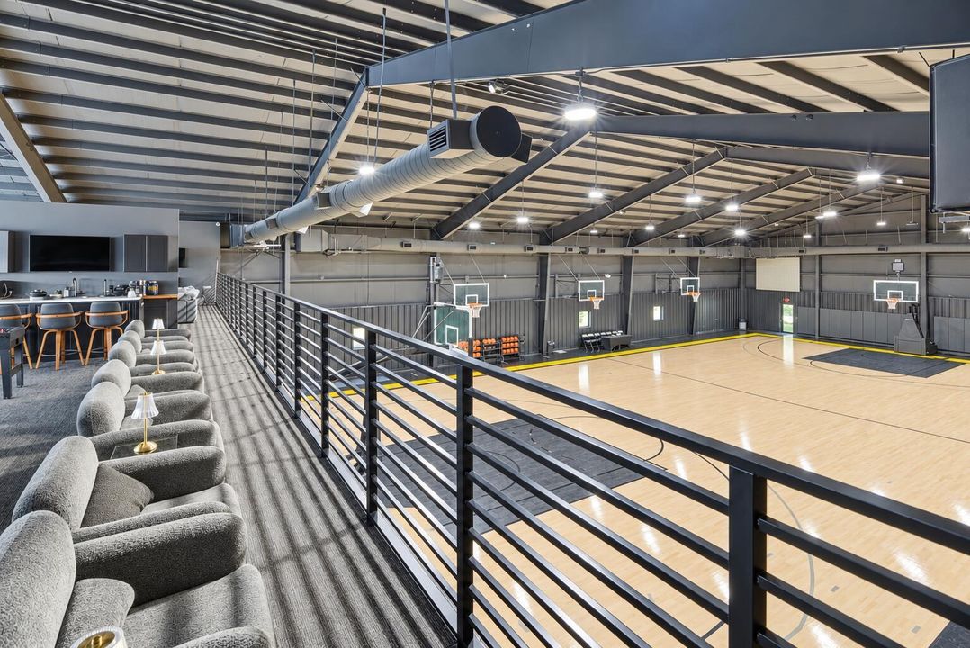 Brightened mezzanine view of basketball