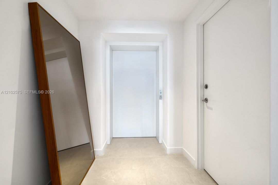 Door to laundry & private elevator