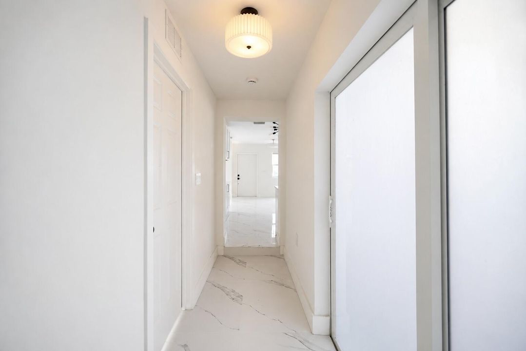 3370 hallway from slider rear patio ligh