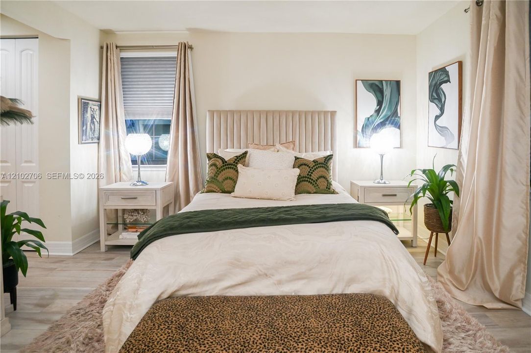 Neutral wall tones paired with light-toned wood-finish flooring