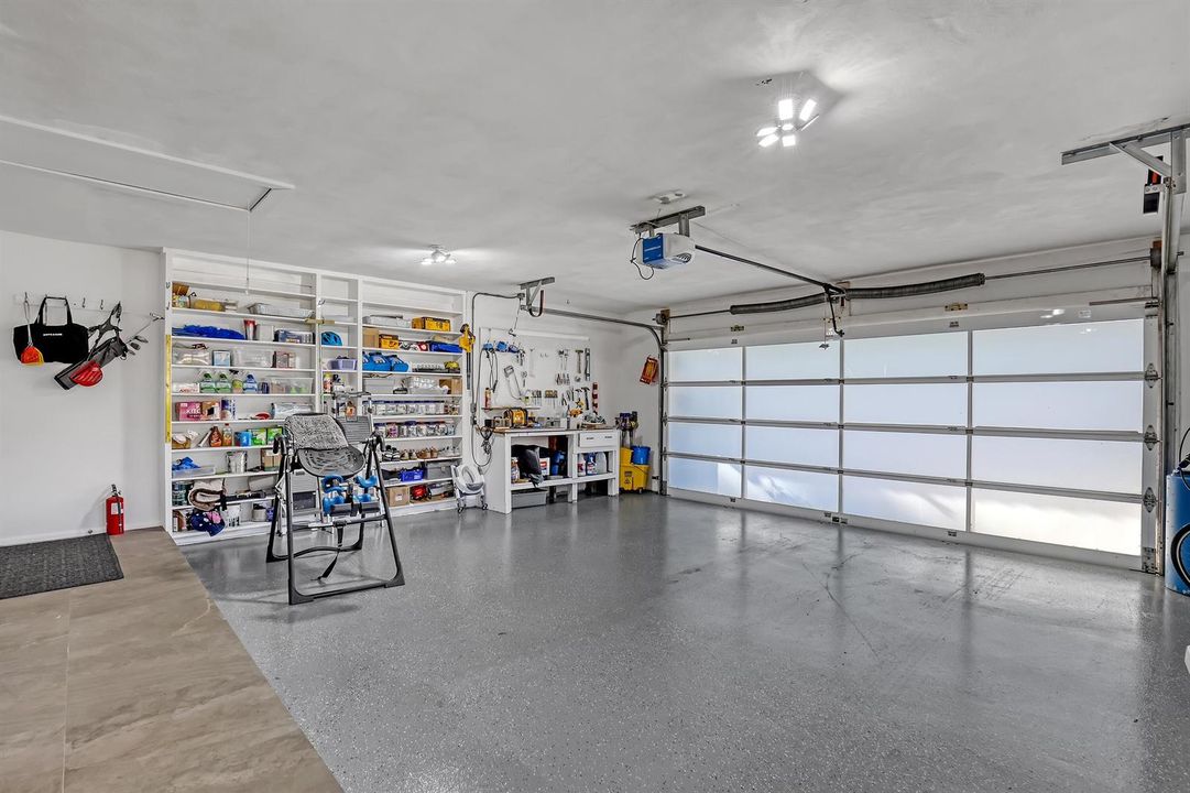 Garage with epoxy floor and glass door