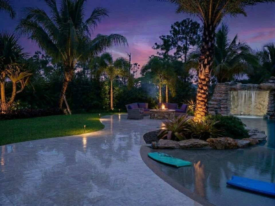 Twilight of pool andoutdoor lounge area