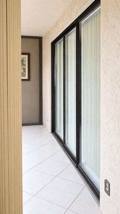 Bright Screened Patio Corridor