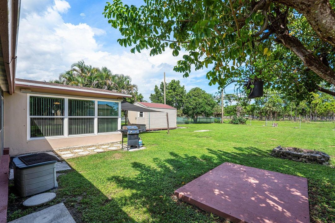 BEAUTIFUL LARGE FENCED YARD!