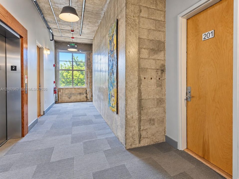 Floor Hallway into Unit