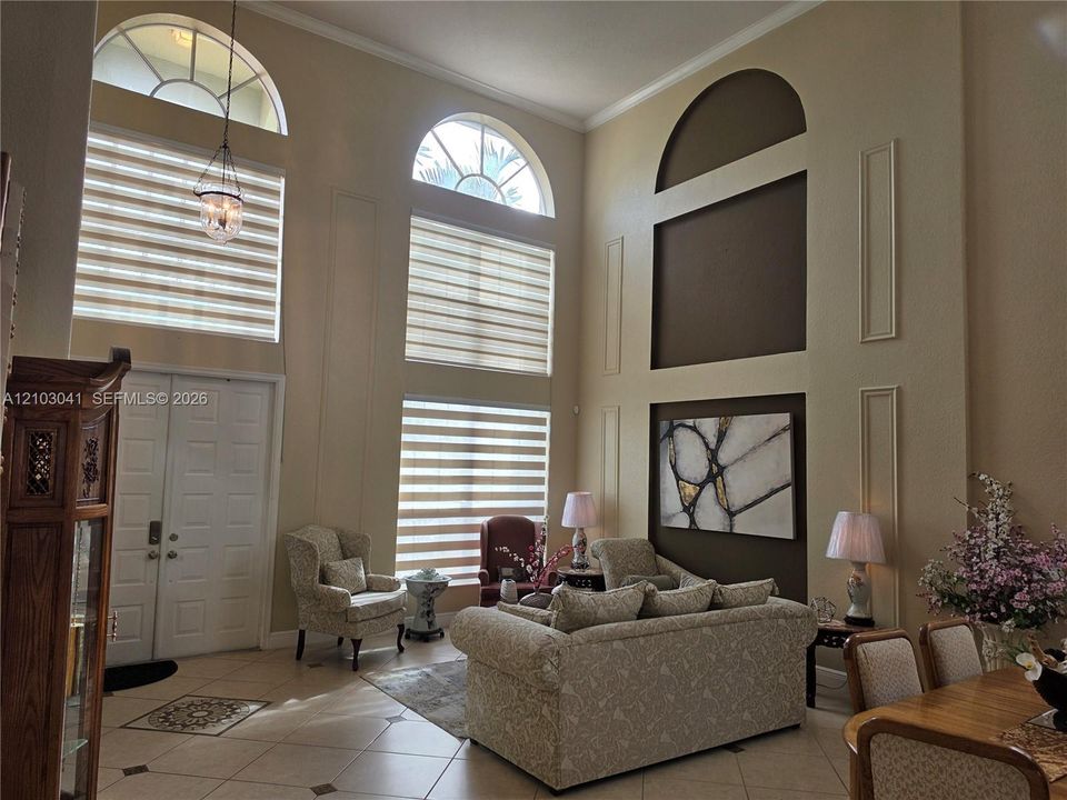 Soaring ceilings with decorative wall paneling