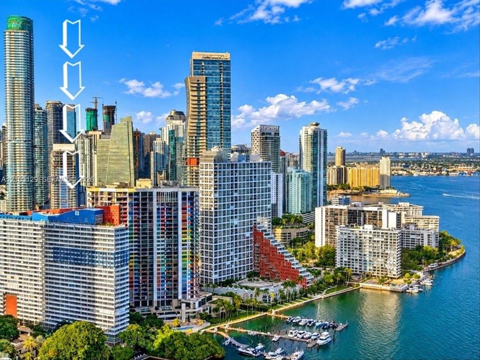 High-rise urban building featuring expansive cityscape surroundings and coastal proximity to the bay