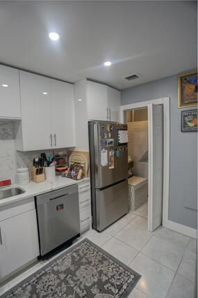 Kitchen to laundry room view 188 Lake Ev